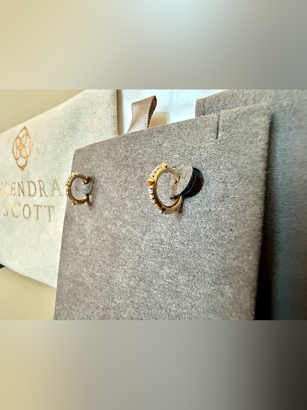 Kendra Scott 14K yellow gold spiked huggie earrings with white diamonds
